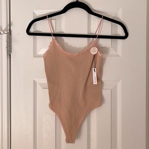 Beige body suit